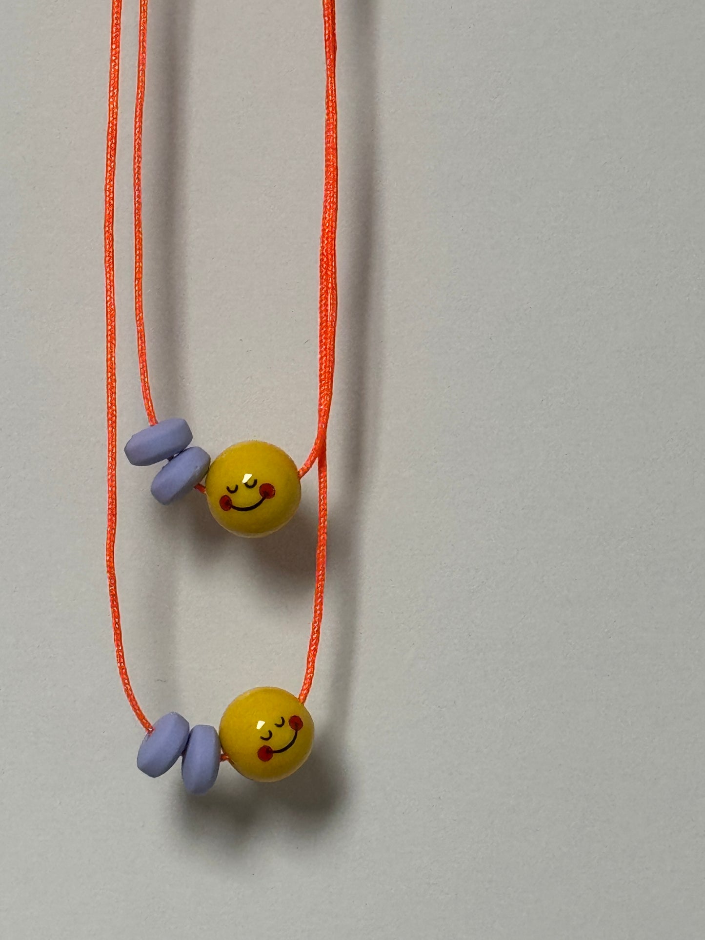Statement-Kette mit Smiley – gute Laune zum Umhängen